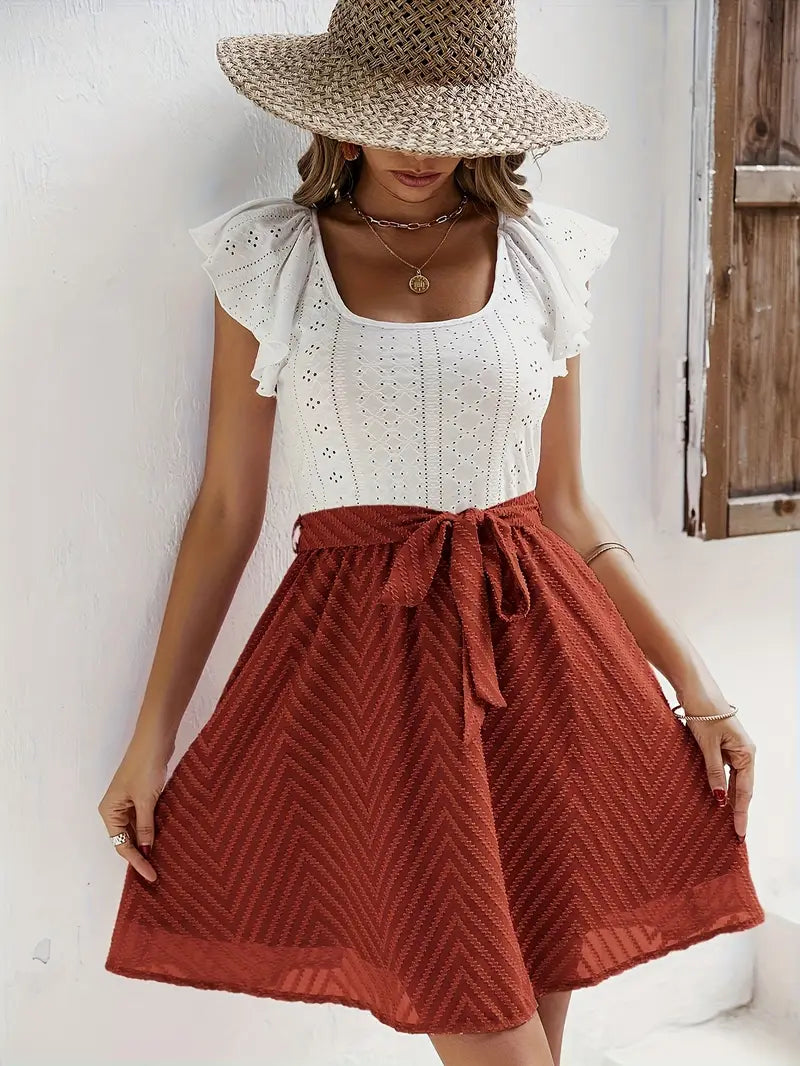 Wilhelmina – Set composto da top con maniche a cappuccio e gonna con cintura