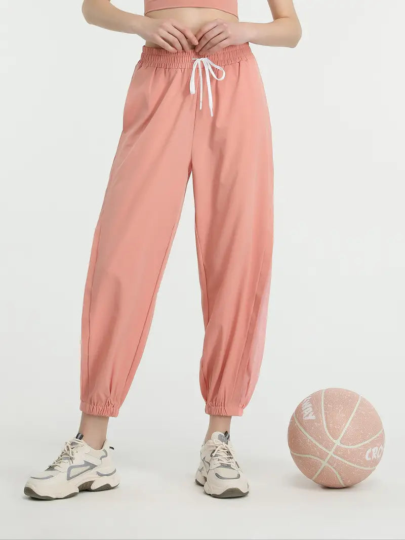 Hexaria – Pantaloni da jogging alla moda con dettagli in rete