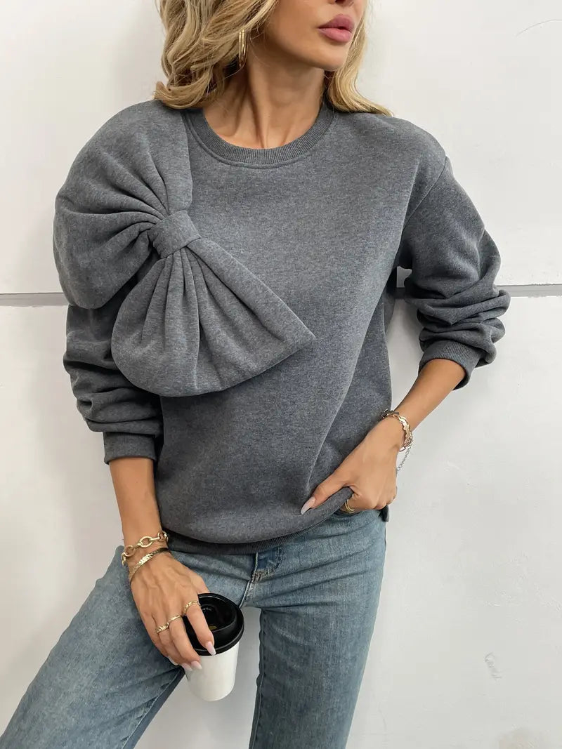 Benia – Maglione elegante con un grande fiocco