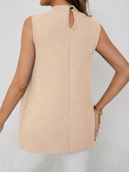 Zyra – Elegante camicetta senza maniche con collo alto