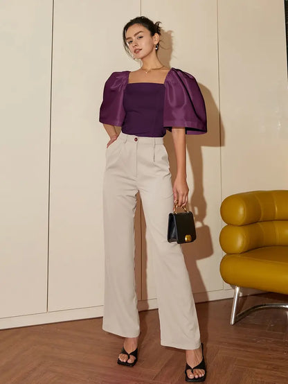 Clara – Elegante camicetta in satin con maniche a sbuffo