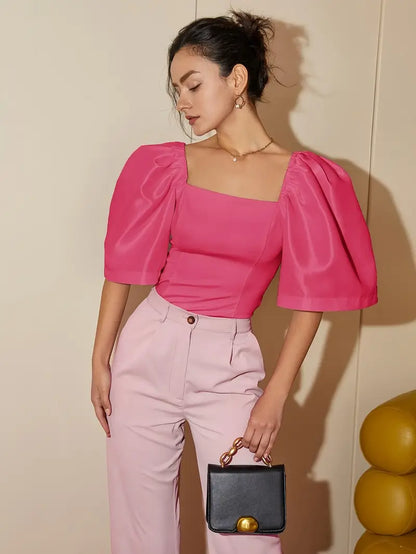 Clara – Elegante camicetta in satin con maniche a sbuffo