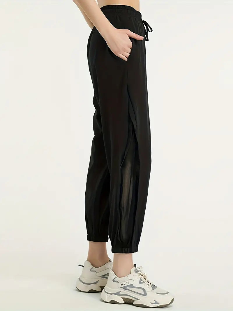 Hexaria – Pantaloni da jogging alla moda con dettagli in rete