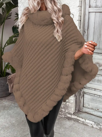 Dahlia – Maglione lavorato a maglia stile poncho