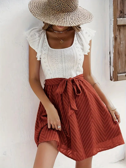 Wilhelmina – Set composto da top con maniche a cappuccio e gonna con cintura