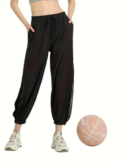 Hexaria – Pantaloni da jogging alla moda con dettagli in rete