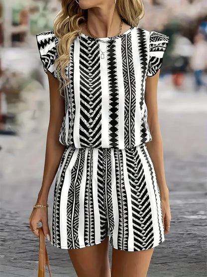 Tara – Tuta alla moda con maniche a cappuccio