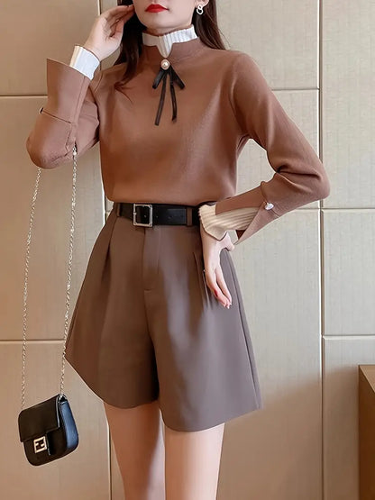 Quinn – Top elegante in cotone con colletto a volant