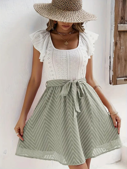 Wilhelmina – Set composto da top con maniche a cappuccio e gonna con cintura