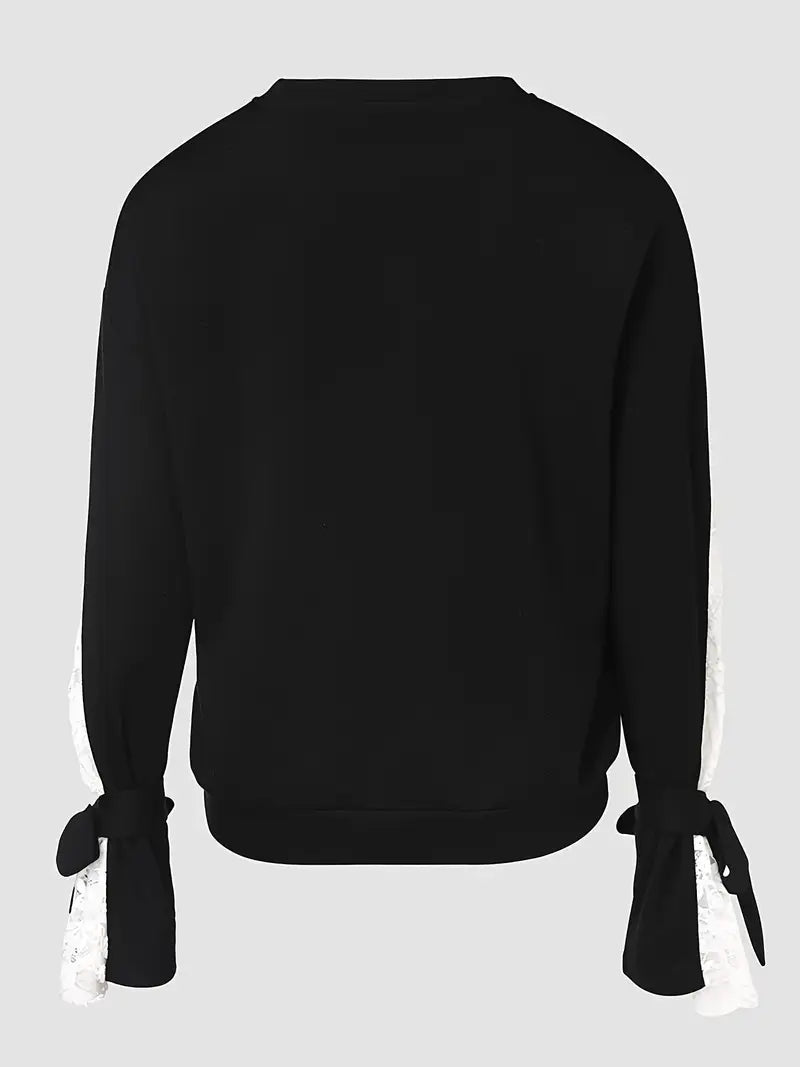 Tafeta – Elegante camicetta in pizzo con motivo floreale