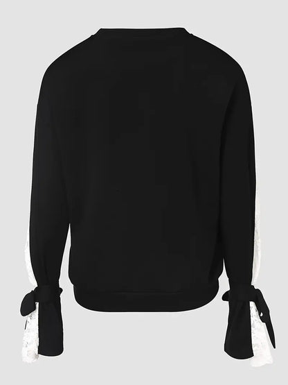 Tafeta – Elegante camicetta in pizzo con motivo floreale