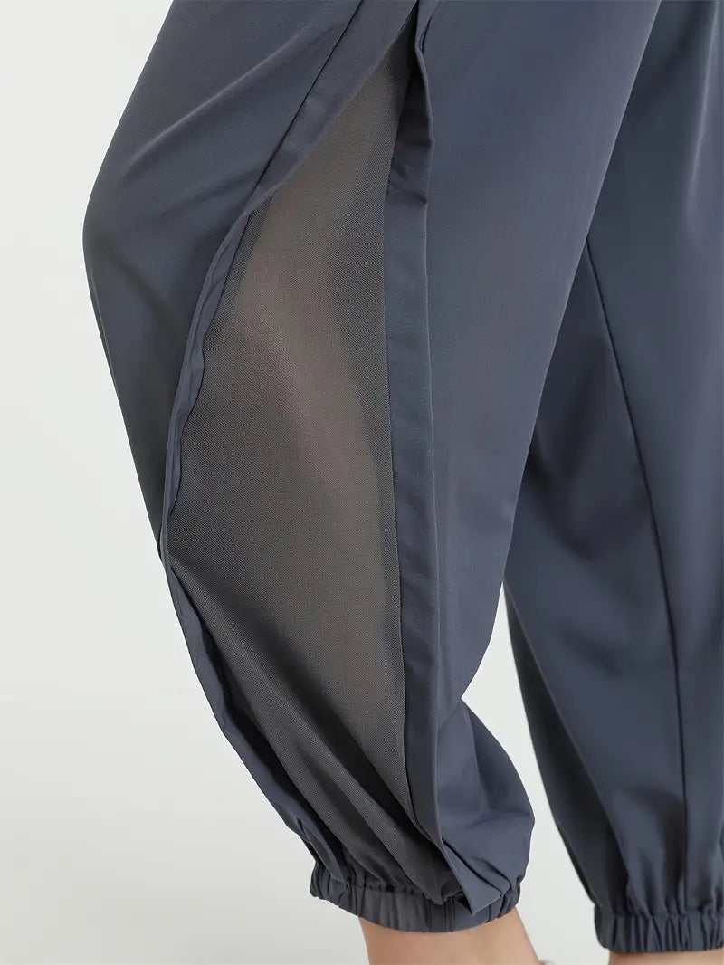 Hexaria – Pantaloni da jogging alla moda con dettagli in rete