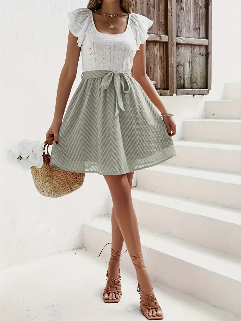 Wilhelmina – Set composto da top con maniche a cappuccio e gonna con cintura