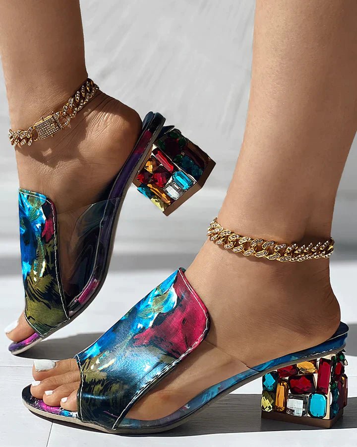 Tovessa – Mules eleganti con tacco largo