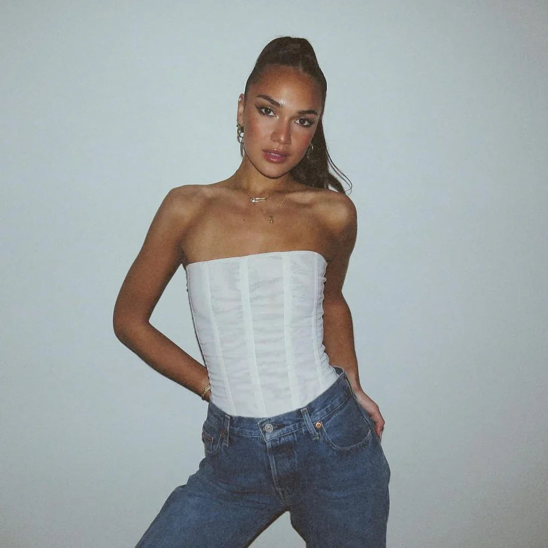 Sylvaya – Top corsetto senza spalline in rete strutturata