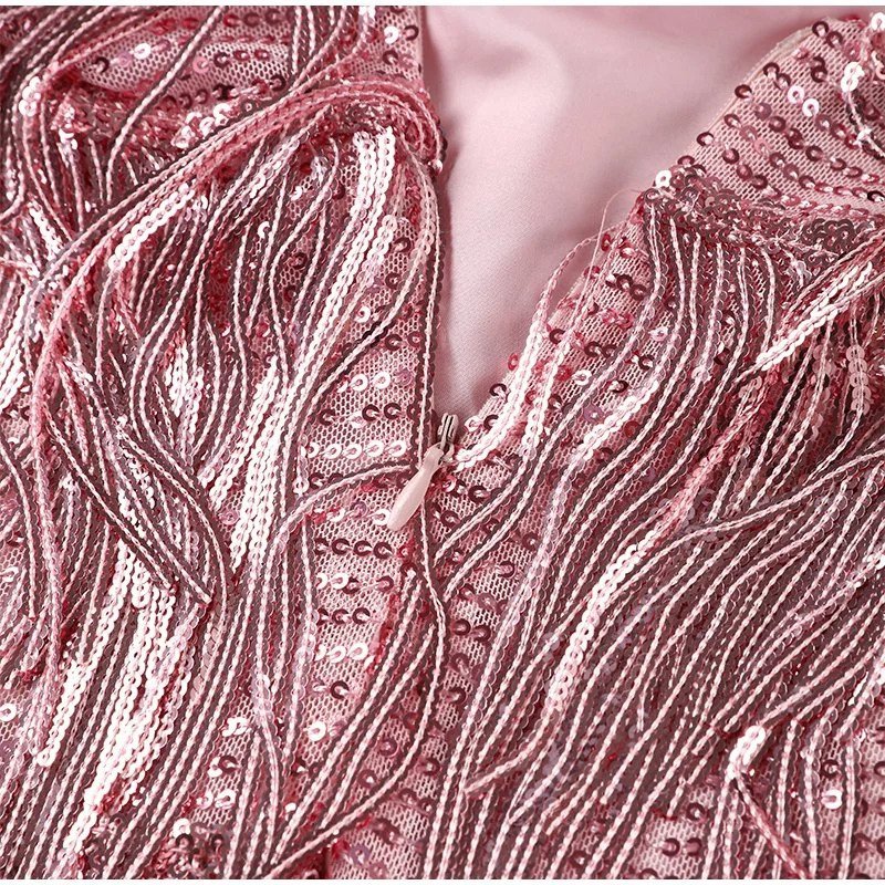 Jiselle – Miniabito lucido ed elegante con frange