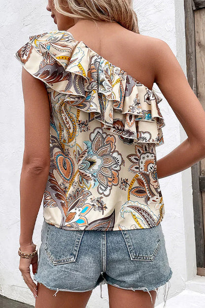 Anoukia – Elegante top monospalla con volant e motivo floreale